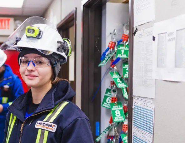 A group of female power engineers work on a task.